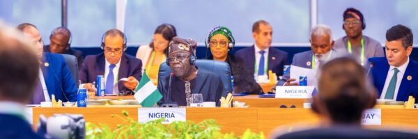 Tinubu at a conference