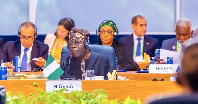 Tinubu at a conference