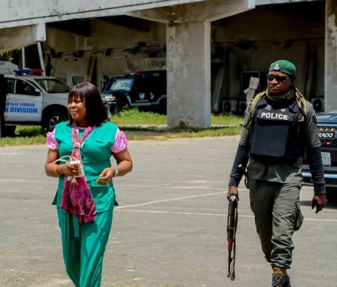 Olatutu going about with police officers